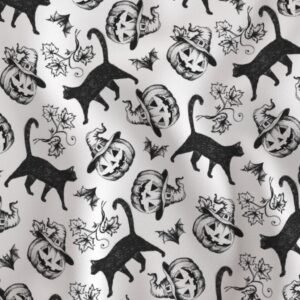 fabric with black cats printed on it